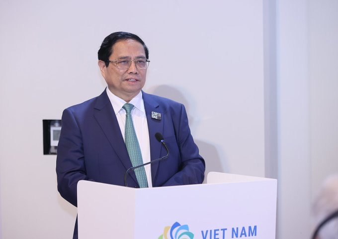 范明正总理在“动员资金兑现越南对气候变化的承诺”活动上致辞。 范明正总理在“动员资金兑现越南对气候变化的承诺”活动上致辞。