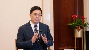 中国广西壮族自治区主席韦韬。