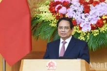 范明正总理在会上致辞。（陈海摄）