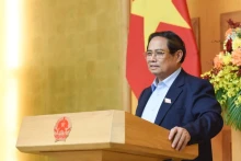 政府总理范明正在会上致辞。（陈海 摄）