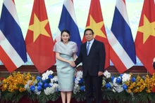 越南政府总理范明正与泰国总理佩通坦。