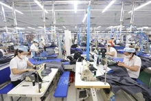 越南纺织品服装业迎来新的出口机会。(图片来源：越通社）