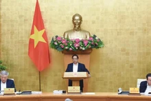 越南政府总理范明正主持政府3月份例行会议和政府与各地方会议。