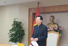 越南政府副总理、第七工作组组长梅文政主持会议。（图片来源：越通社）