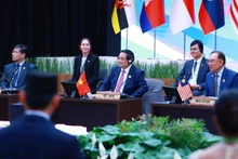 越南政府总理范明正出席与东盟议会联盟对话会。（图片来源：越通社）
