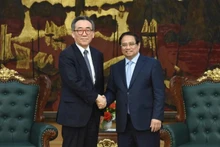 范明正总理与韩国外长赵兑烈。