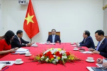 越南政府总理范明正与马来西亚总理安瓦尔·易卜拉欣通电话。