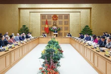 越南政府总理范明正主持召开越南政府与美国企业座谈会。