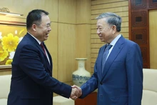 苏林大将会见中国武警部队参谋长周建国。