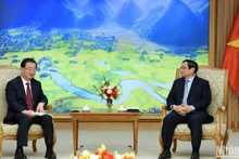 越南政府总理范明正会见中国云南省委书记王宁。(陈海 摄)