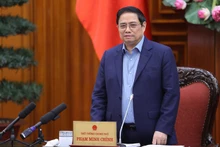 范明正总理在会上发表讲话。