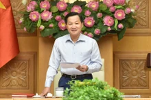 越南政府副总理、物价委员会主任黎明慨。