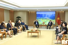 越南政府总理范明正会见古巴司法部长奥斯卡