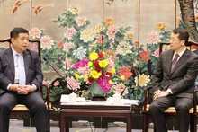 阮志勇副总理会见广东省常务副省长张虎。