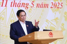 范明正总理在会上发表指导性讲话。（图片来源：越通社）