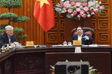 越南政府党委书记、政府总理范明正主持政府党委常委会会议。