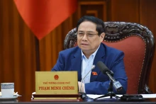 政府总理范明正主持召开政府常务委员会有关抑制通胀的会议。