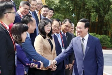 越南国家主席武文赏会见出席2023年口腔医学学术研讨会暨展览会的国内外专家学者代表。（图片来源：越通社）