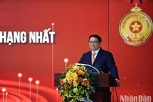 政府总理范明正出席会议并发表讲话。（陈海 摄）