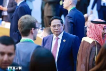 越南政府总理范明正出席“反饥饿与贫困”讨论会。（图片来源：越通社）