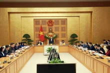 政府副总理陈红河和各位代表召开有关儿童的会议。（图片来源：VGP）