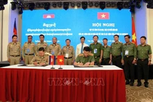 双方签署合作协议。（图片来源：越通社）