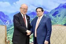 政府总理范明正会见日越友好议员联盟特别顾问武部勤。（图片来源：越通社）