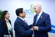 范明正总理在会见美国总统拜登。（图片来源：越通社）