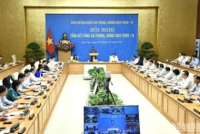 越南政府总理范明正主持召开新冠肺炎疫情防控工作总结会议。