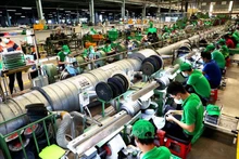 附图：胡志明市工业生产逐渐重拾对投资者的吸引力。（图片来源：越通社）