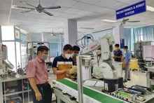 附图：胡志明市领导人呼吁加拿大投资者关注对胡志明市辅助工业、高技术。