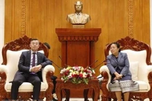 老挝国会常务副主席顺通·赛雅佳会见越南国家审计署审计长吴文俊。