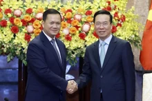 越南国家主席武文赏会见柬埔寨首相洪玛奈。（图片来源：VGP）