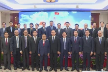 双方代表合影。