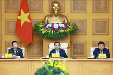 越南政府总理范明正同日本企业举行座谈会。（图片来源：越通社）