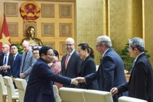 政府总理范明正主持召开越南政府与美国企业座谈会【组图】