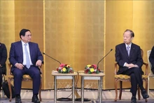 范明正总理会见日越友好议员联盟主席二阶俊博。（图片来源：越通社）
