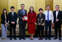 双方代表合影。（图片来源：cadn.com.vn）