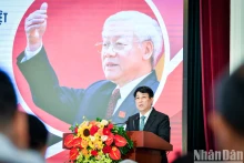 越共中央书记处常务书记梁强发表讲话。