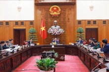 范明正总理主持会议。（图片来源：越通社）
