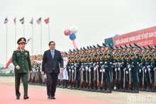 越南政府总理范明正出席2022年越南国际防务展。