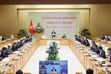 范明正总理主持会议。（图片来源：VGP）