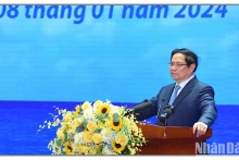范明正总理在会议上发表讲话。