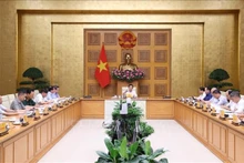 会议场景。（图片来源：qdnd.vn）