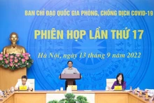 范明正总理主持会议。（图片来源：VGP）