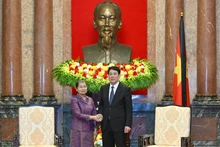越南国家主席梁强会见柬埔寨人民党副主席梅森安。