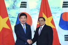 越南政府总理范明正会见韩国国会议长金振杓。