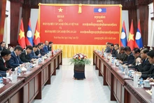 会谈场景。（图片来源：cand.com.vn）