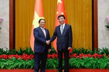 范明正总理会见中国全国政协主席王沪宁。（图片来源：baochinhphu.vn）
