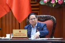 范明正总理在会上发表讲话。